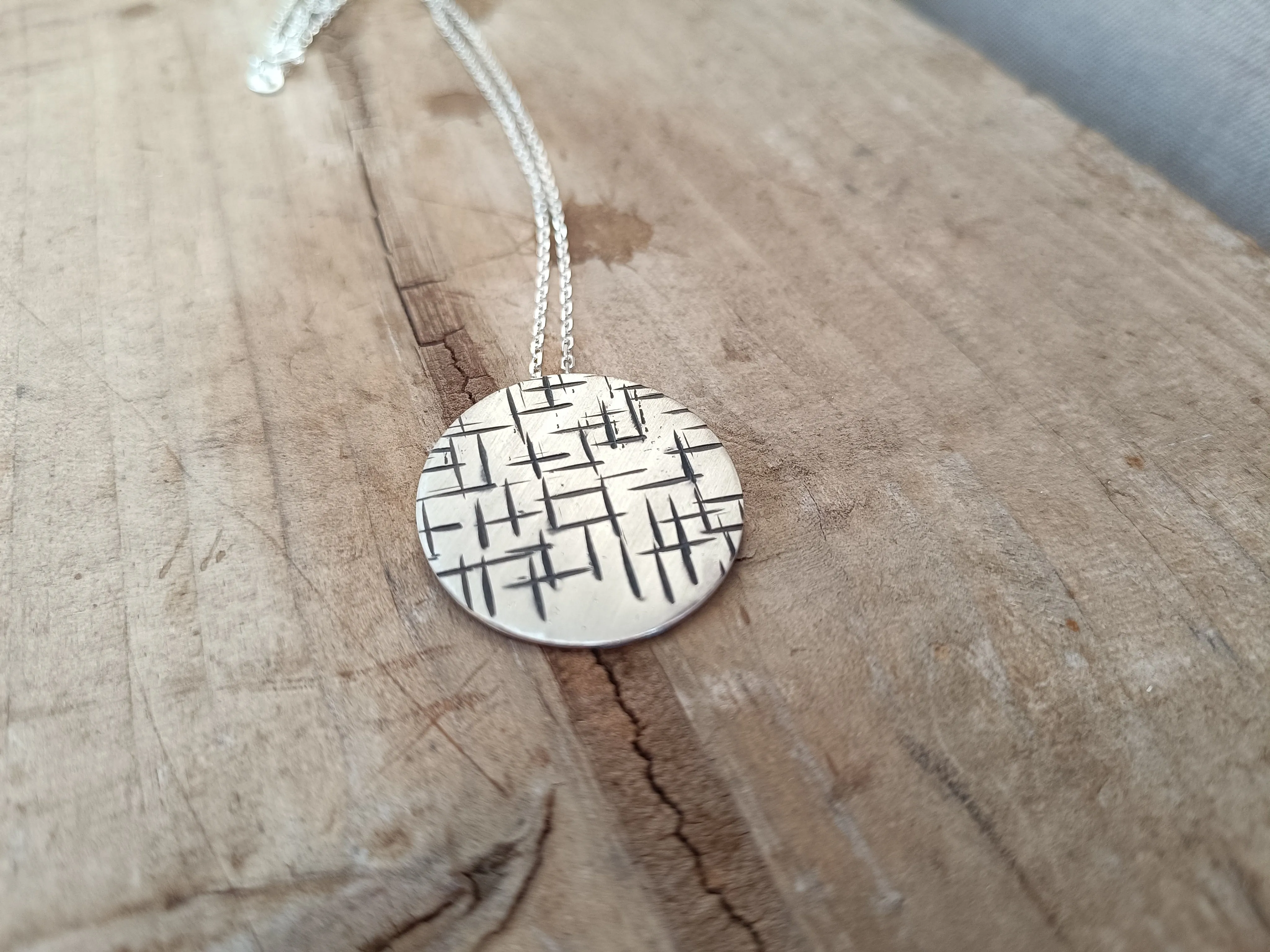 A Maze In Round on Long Silver Chain
