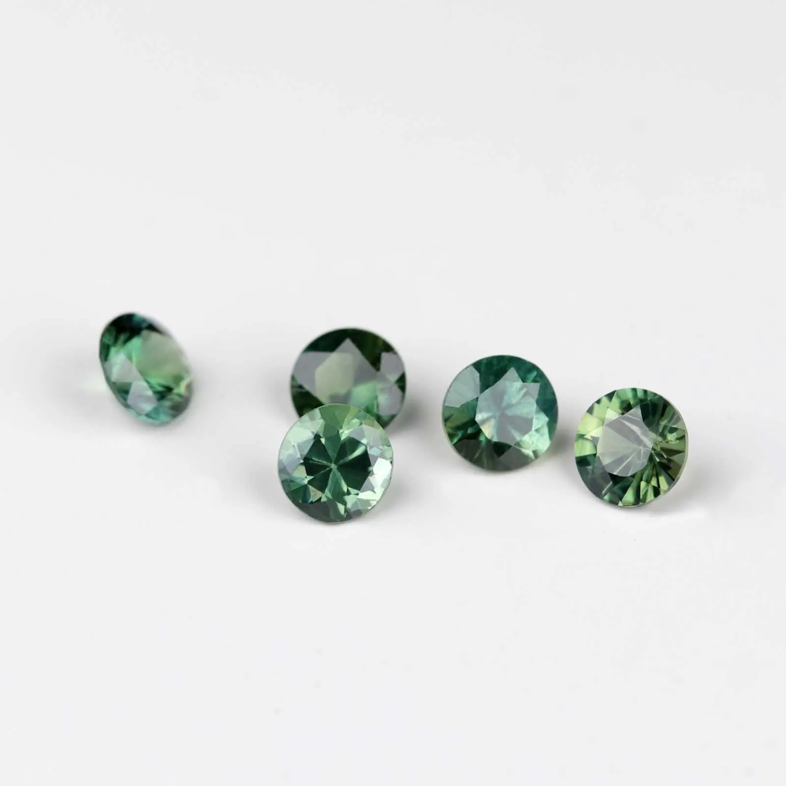 Bead-Set Five Stone Ring with Green Australian Sapphire and Medium Champagne Diamonds