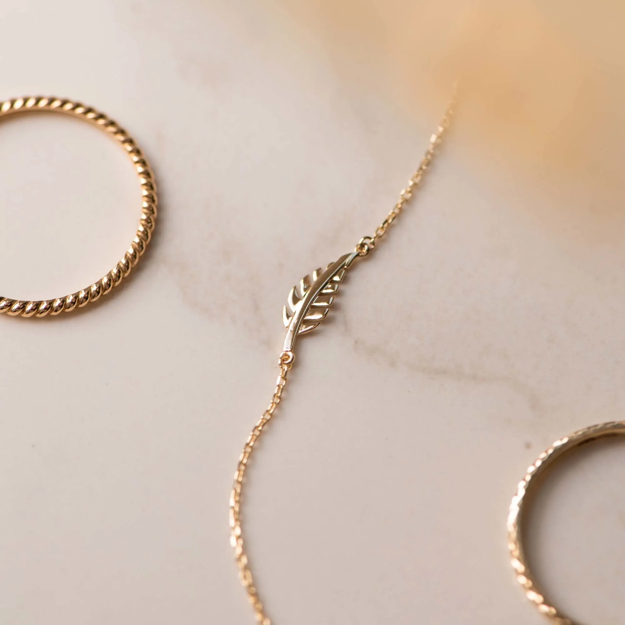 Monceau Giselle 14 karat gold bracelet with feather